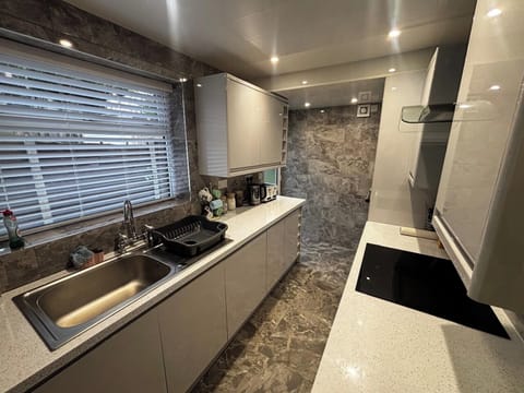 Modern kitchen with cooking utensils