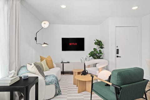 Thoughtfully furnished to provide the perfect blend of modern luxury and cozy delights, this welcoming living room invites you to sit and stay a while. 