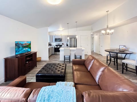 Spacious living room with open floor plan and smart tv