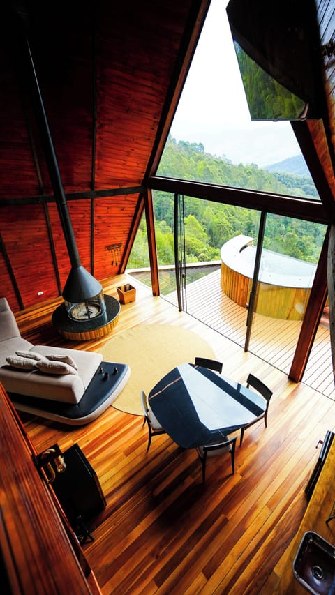 Deluxe Chalet, Patio, Mountain View | Living area | LCD TV, fireplace
