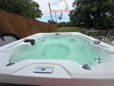 Relax in the hot tub while taking in views of Globe Life Field. 