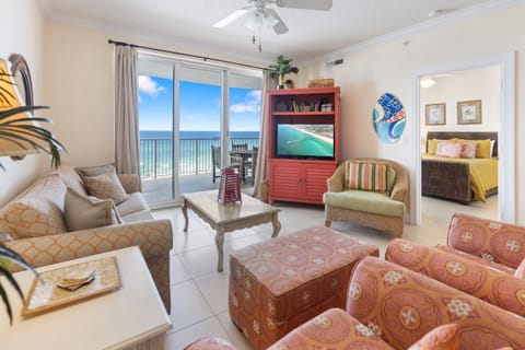 Relax in your bright living room with stunning ocean views and comfortable seating for the whole family.