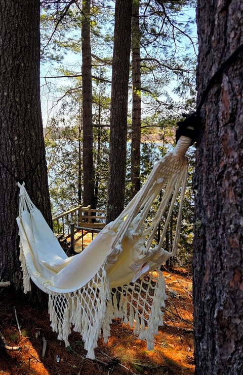 Let the sea breeze drift you to sleep under the tall white pines.