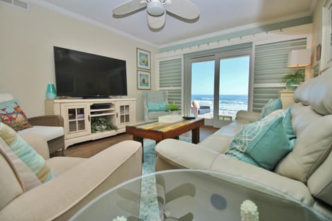 Condo, Multiple Beds (Sea Coast Gardens III 105) | Living area | TV
