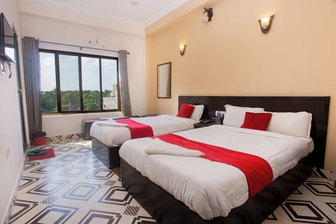 Deluxe Room, 1 Bedroom, Non Smoking, Garden View | Laptop workspace, iron/ironing board, free WiFi, bed sheets