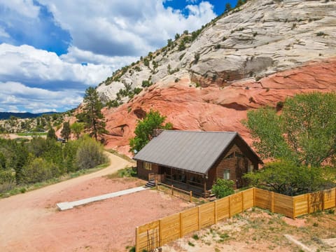 Nestled in the pituresque red rock of  Southern Utah!  This Cabin has the majestic cliffs right in the back yard!  One of the most unique stays near Zion National Park.
