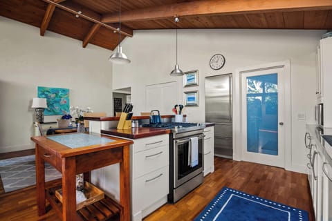 There is a breakfast bar in the kitchen with barstool seating for a more casual meal
