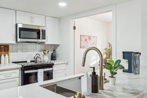 Save money from eating out by cooking whatever you want in this fully stocked, remodeled kitchen.