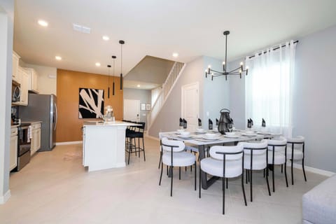 Gather for meals in a chic dining space that’s perfect for family feasts and group celebrations.