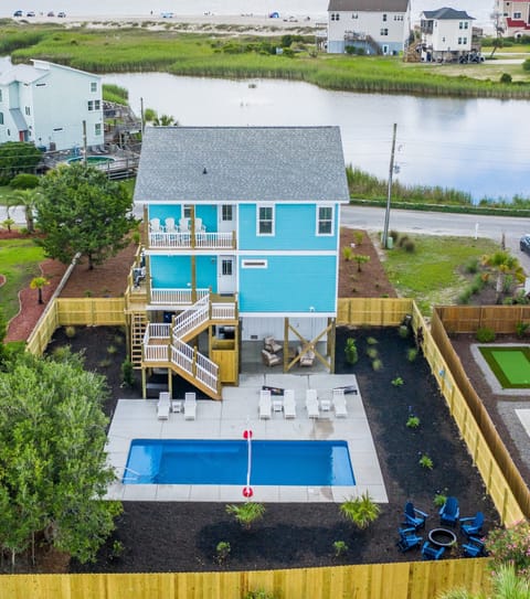 New construction- private back yard, heated pool, and fire pit.