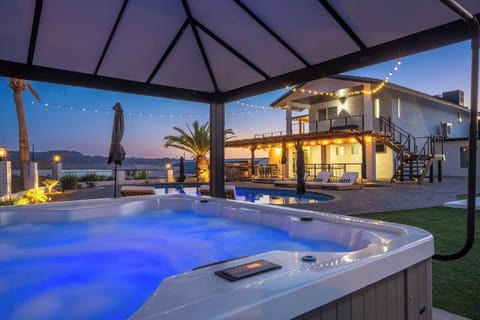 Our oversized hot tub holds up to 8 guests.  