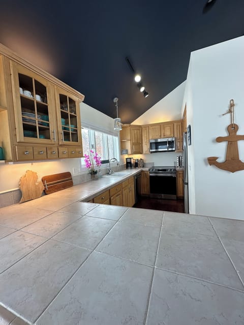 Sleek appliances meet stylish design in the heart of the home.