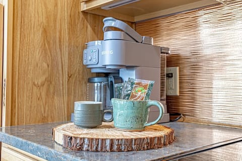 Start your day with coffee or tea on the porch or in the cozy living room