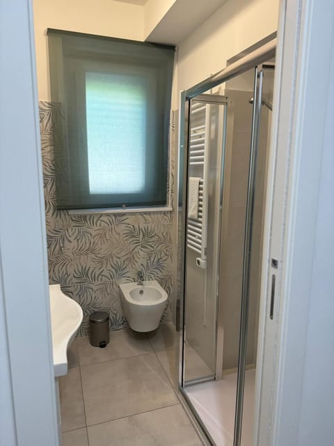 Classic Quadruple Room | Bathroom | Bathrobes