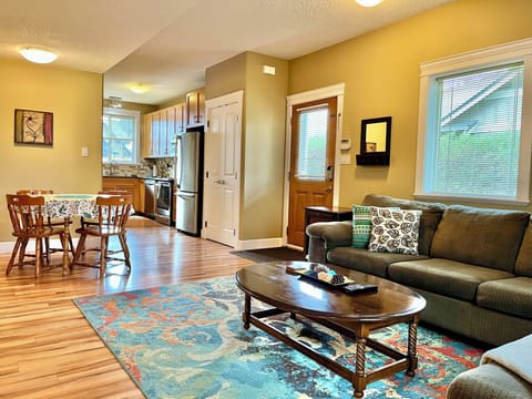 Living room, entry way, dining area and kitchen