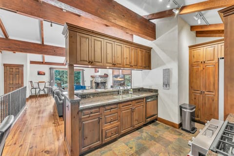 Kitchen: Drip coffee maker, toaster, Crockpot, cooking utensils, tableware