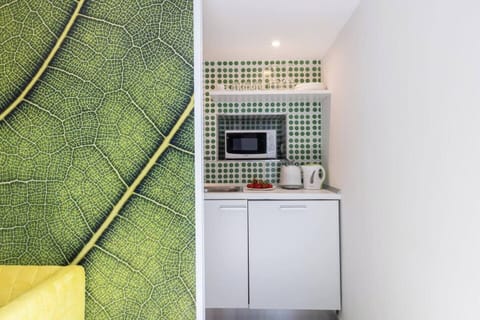 Villa | Private kitchen | Espresso maker, coffee/tea maker, electric kettle, highchair