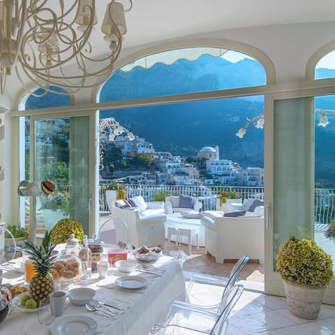 Villa | Living area | Smart TV, fireplace, video-game console, books