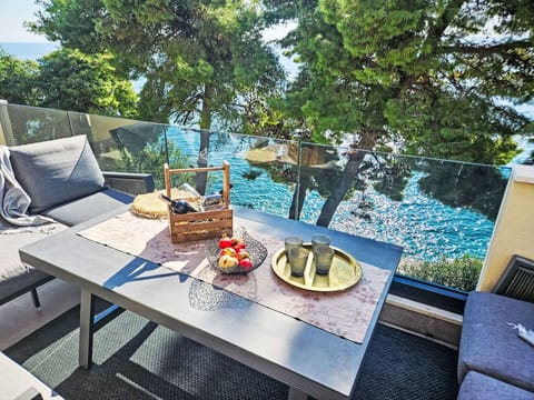 Blue, Body Of Water, Water, Coastal And Oceanic Landforms, Coast, Sea, Outdoor Furniture, Shore, Ocean, Shade