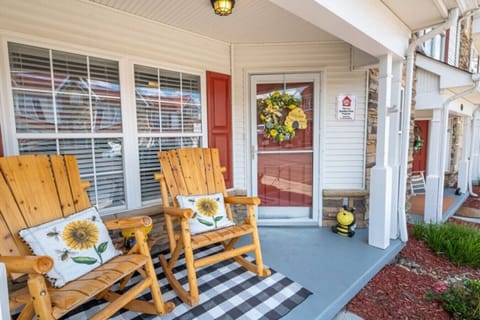 The front porch of Honey Bee Mine includes two rockers just outside the front door.