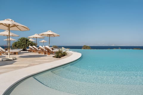 Indoor pool, seasonal outdoor pool, pool umbrellas, sun loungers