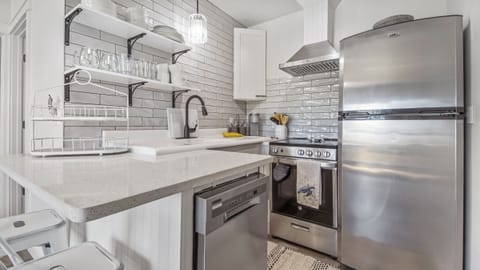 The full kitchen is quaint, but it provides everything you need for a good stay.