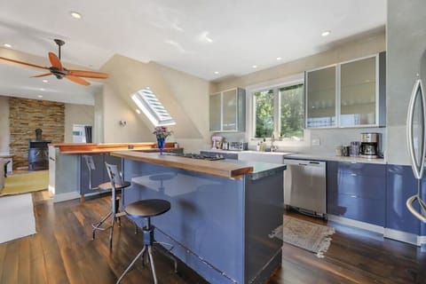 Kitchen island seating for three with coffee maker and dishwasher!