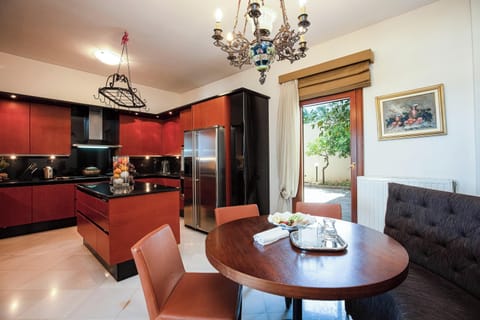 Fully equipped kitchen with modern appliances.