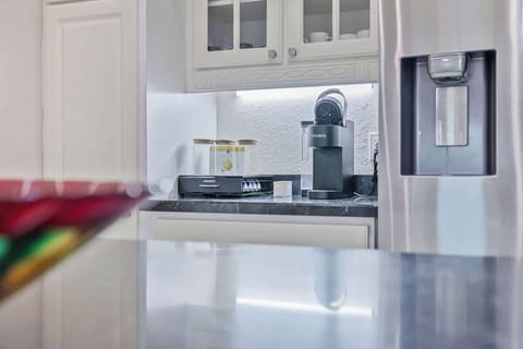 Start your day with a fresh brew from the coffee maker, located in the fully equipped kitchen for your convenience. #CoffeeLovers #MorningBrew