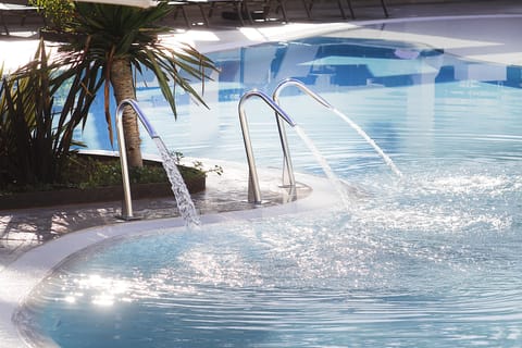 Indoor pool, outdoor pool, open 8:00 AM to 7:00 PM, pool umbrellas