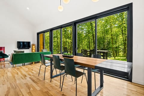 Step into a space designed for both functionality and style, where culinary creativity meets elegant dining. The open-concept kitchen is a chef’s dream, featuring sleek countertops, state-of-the-art appliances, and ample cabinetry for all your kitche
