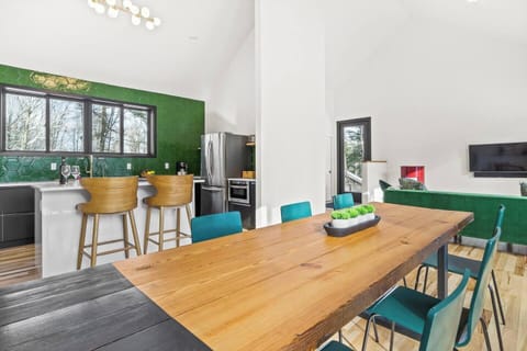 Step into a space designed for both functionality and style, where culinary creativity meets elegant dining. The open-concept kitchen is a chef’s dream, featuring sleek countertops, state-of-the-art appliances, and ample cabinetry for all your kitche