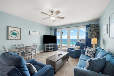 Relax in this coastal living room with ocean views and comfortable seating.