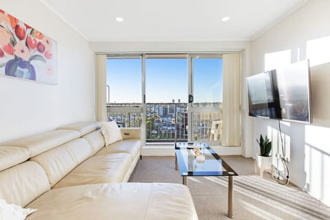 Relax on the couch and watch TV on your large widescreen TV.