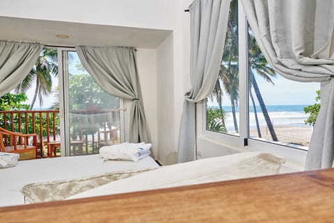 Deluxe Double Room, Sea View, Oceanfront (A) | Blackout drapes, WiFi (free), bed sheets