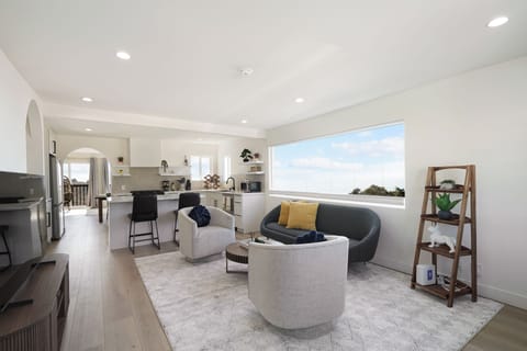 Deluxe House, 3 Bedrooms, Ocean View | Living area | 55-inch flat-screen TV with digital channels