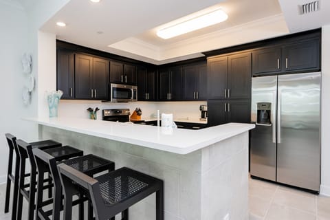 Condo, 3 Bedrooms | Private kitchen | Fridge, oven, coffee/tea maker
