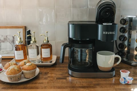 Enjoy host-provided drip- and Keurig coffee with flavored syrup.