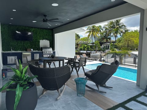 Comfortable and relaxed seating on this covered patio that exudes the Florida lifestyle