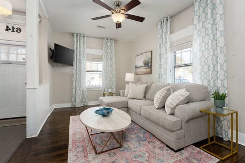 Step into your dreamy pink cottage getaway, perfectly tucked away on Queen Street in the heart of historic Wilmington.