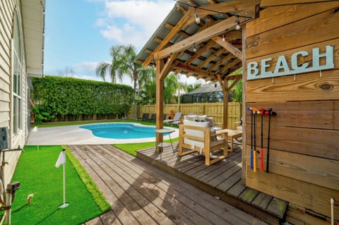 Private backyard oasis with pool and lounge area