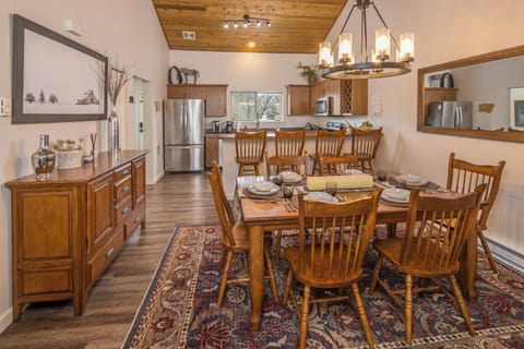 The dining table provides seating for 6 to enjoy a meal together | Main Level
