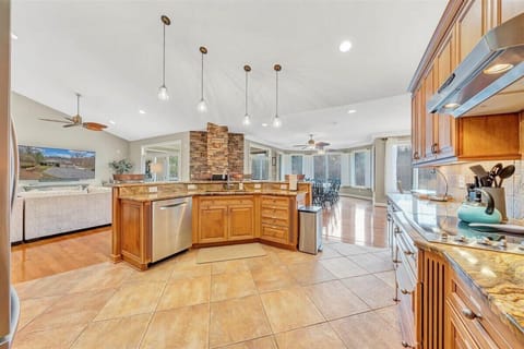 Granite countertops, and top quality appliances fill this kitchen for all of your needs during meal time.
