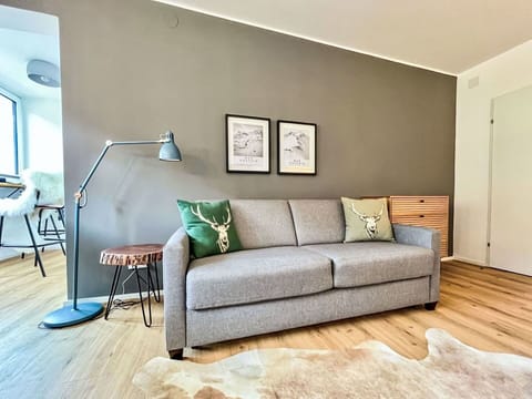 Furniture, Interior Design, Flooring, Couch, Floor, Wall, Living Room, Wood, Room, Home