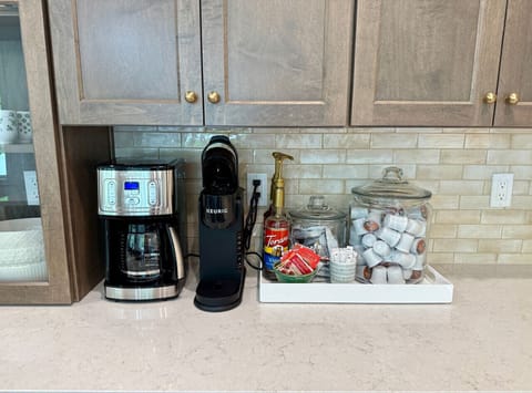 rew & Refresh Station: Enjoy your morning with premium coffee options and sweeteners at your fingertips!