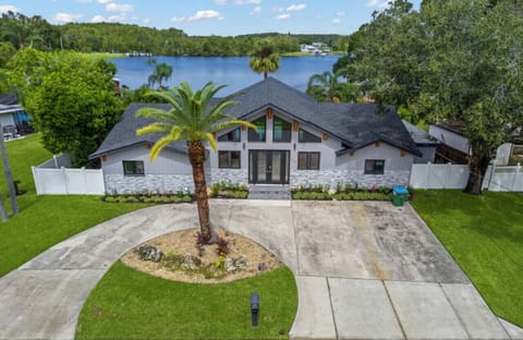 Welcome to Freshwater Cove, your serene escape on Lake Tarpon. Enjoy stunning lake views and modern luxury in this spacious Palm Harbor retreat.