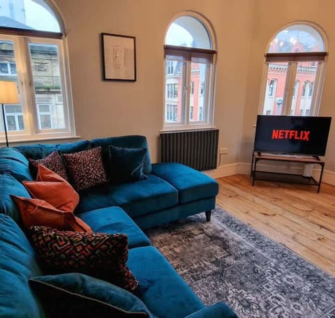 Kick back in a super stylish living space with room for the whole group to relax