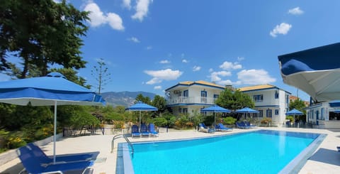 Shared Pool Area – Relax by the Water in a Peaceful Garden Setting

