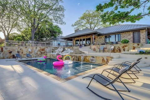 Large lower pool with slide and waterfall