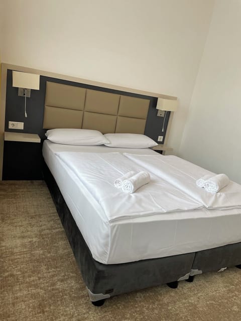 Desk, laptop workspace, free WiFi, bed sheets